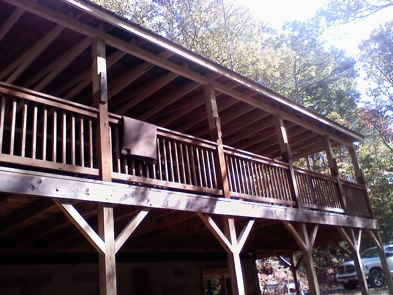 Timber framing under a new elevated porch and deck — Roof Leak Repair in Purcellville by Roofing Brothers